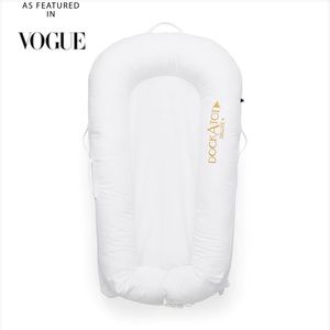 Like new dock-a-tot deluxe plus.